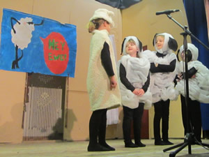 Pupils at St. Aidans acting as lambs in school play