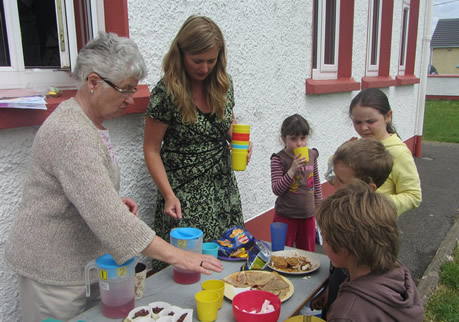 Parents Association stall of cakes in St. Aidans NS field.