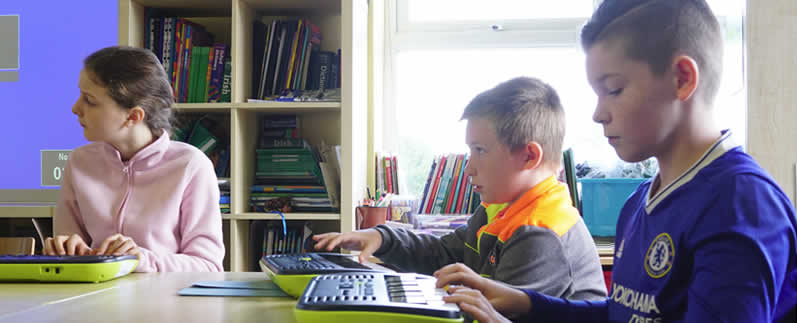Pupils learning keyboard at St. Aidans Ballintrillick