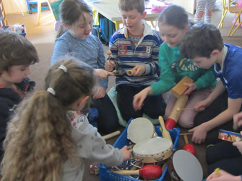 Children selecting musical instruments at St Aidans NS Ballintrillick