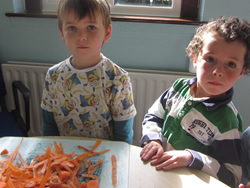 Kids at St Aidans NS Ballintrillick preparing carrots for their soup